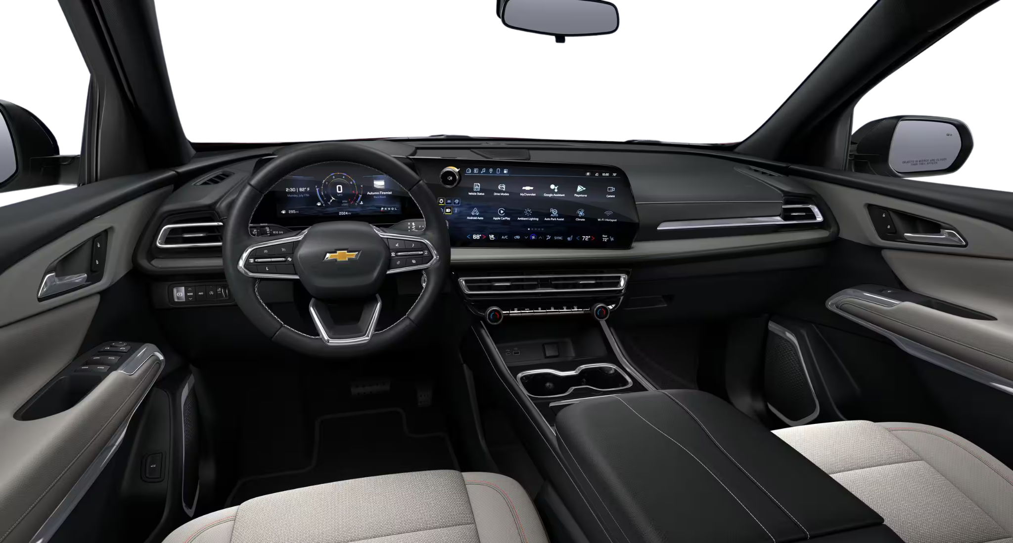Dashboard of 2025 Chevrolet Traverse with expansive digital display, modern infotainment system, and sleek black-gray interior