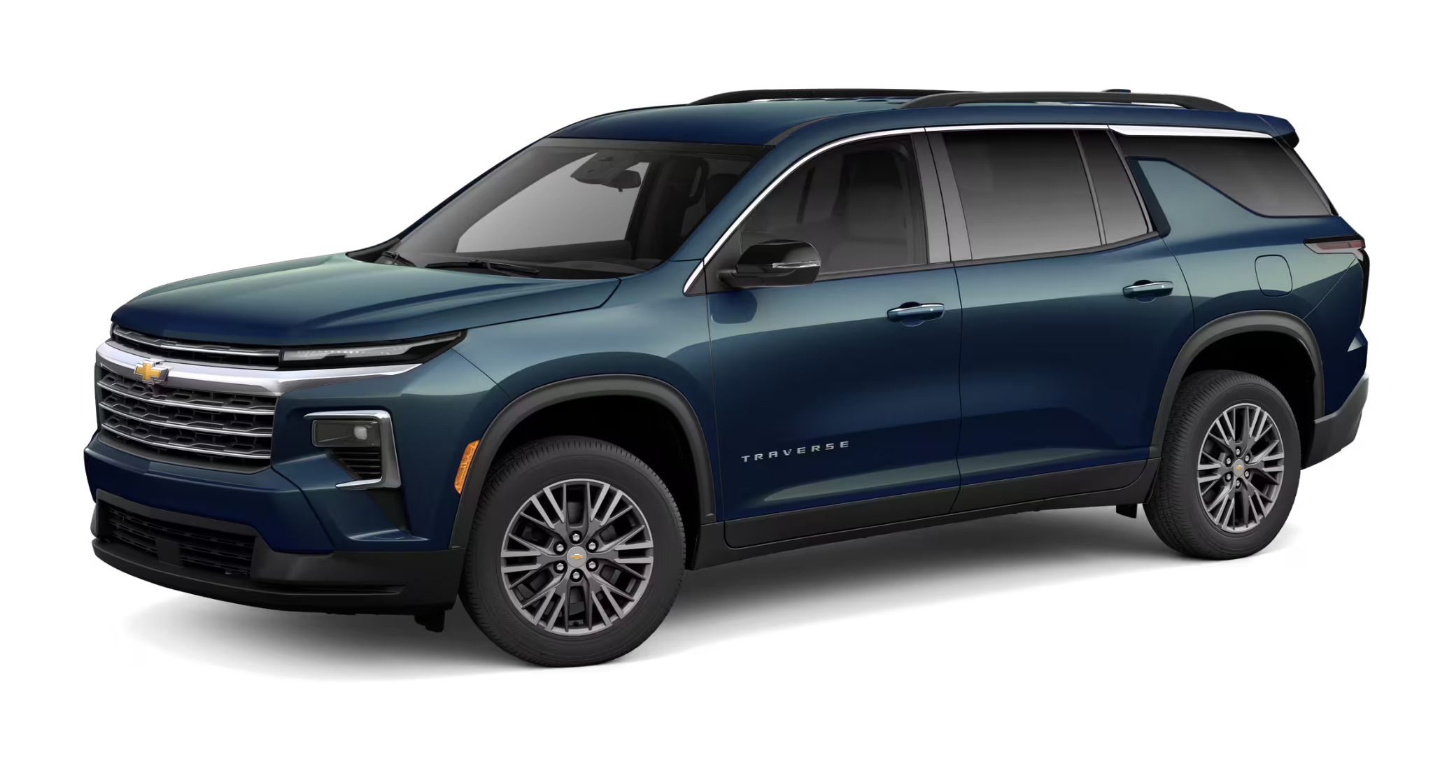 Side profile of 2025 Chevrolet Traverse AWD in dark blue metallic with aerodynamic body lines and chrome trim accents