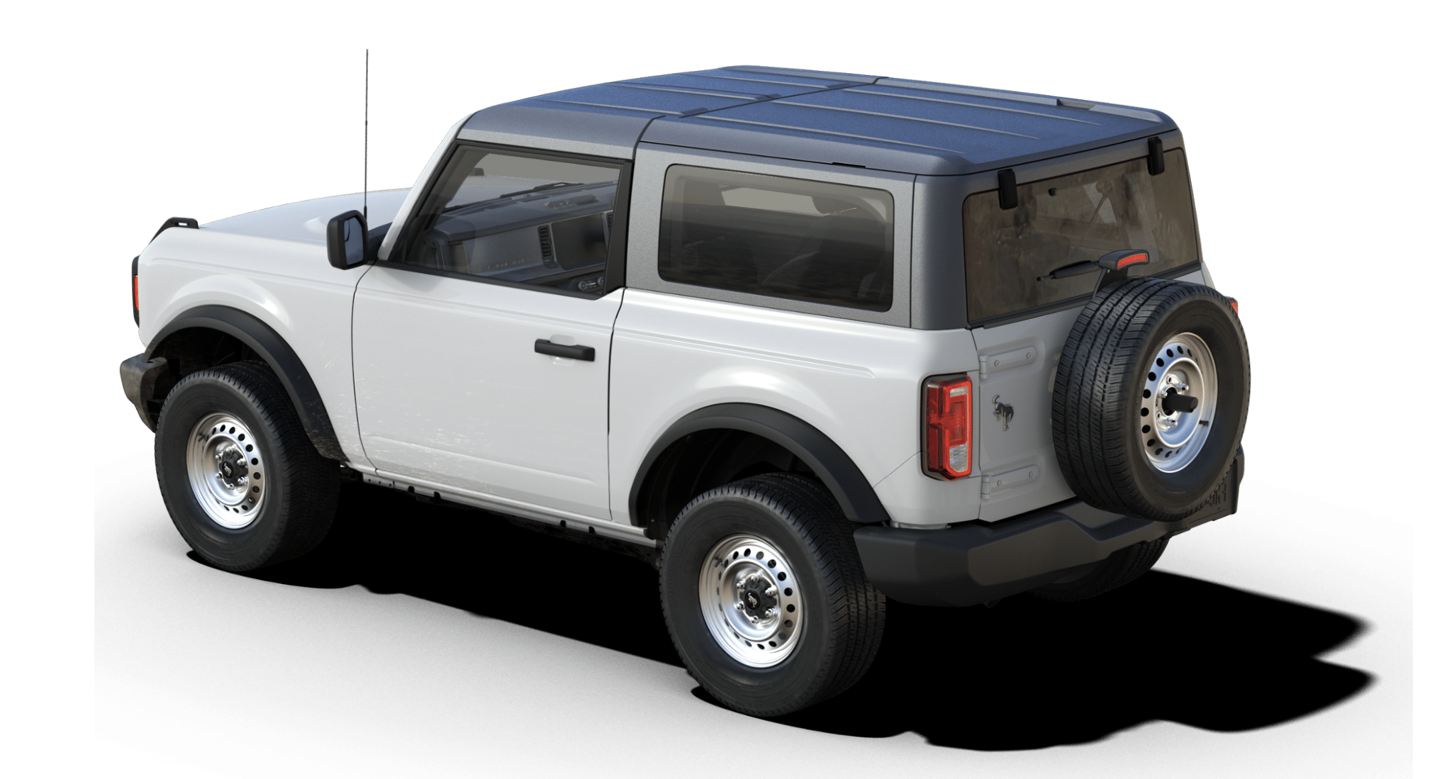 Rear three-quarter view of the 2025 Ford Bronco Base 4x4 highlighting spare tire, privacy glass, and off-road stance