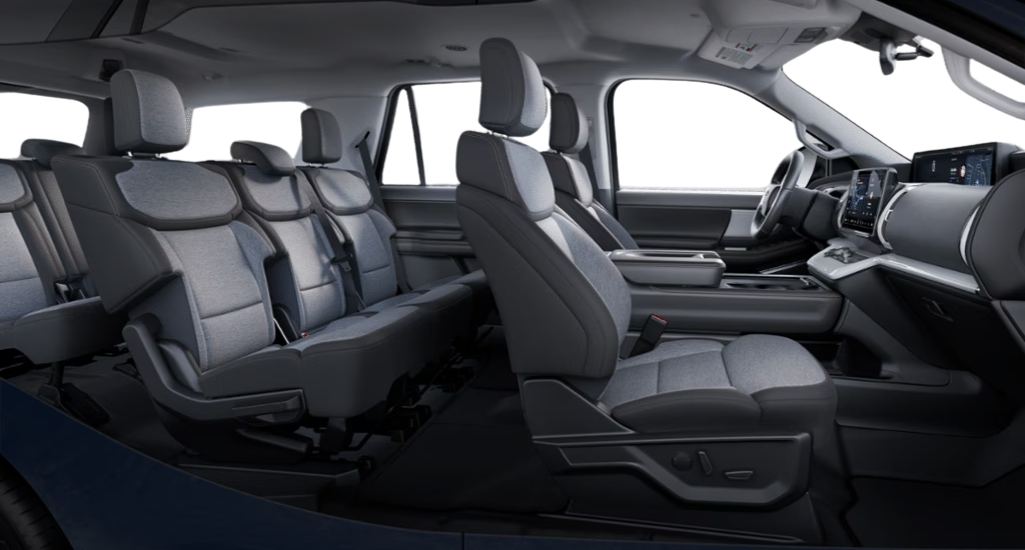 Side profile of the 2025 Ford Expedition Active 4X4 interior showing three-row seating with premium cloth and spacious legroom.