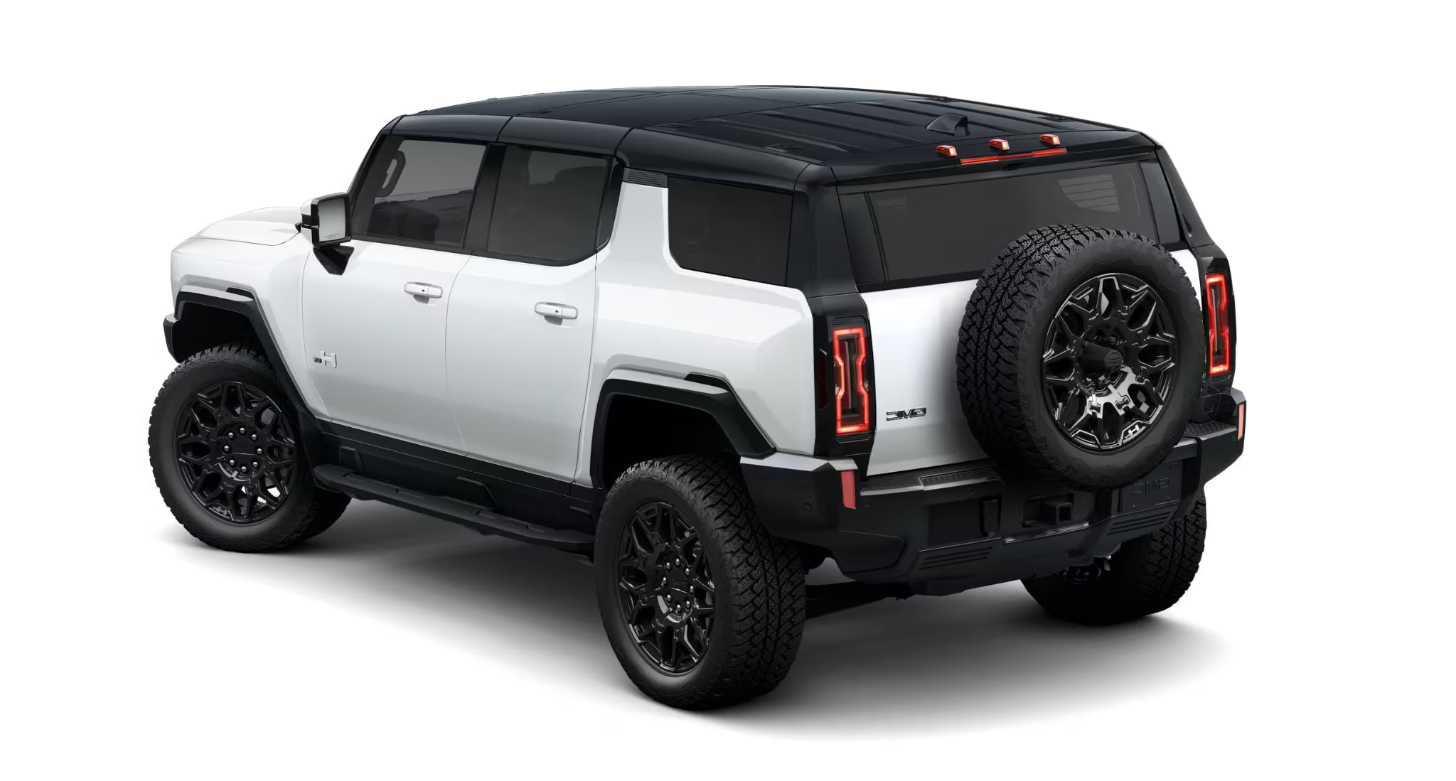 2025 GMC Hummer EV SUV rear view highlighting rugged spare tire mount, vertical LED taillights, and bold white and black design.