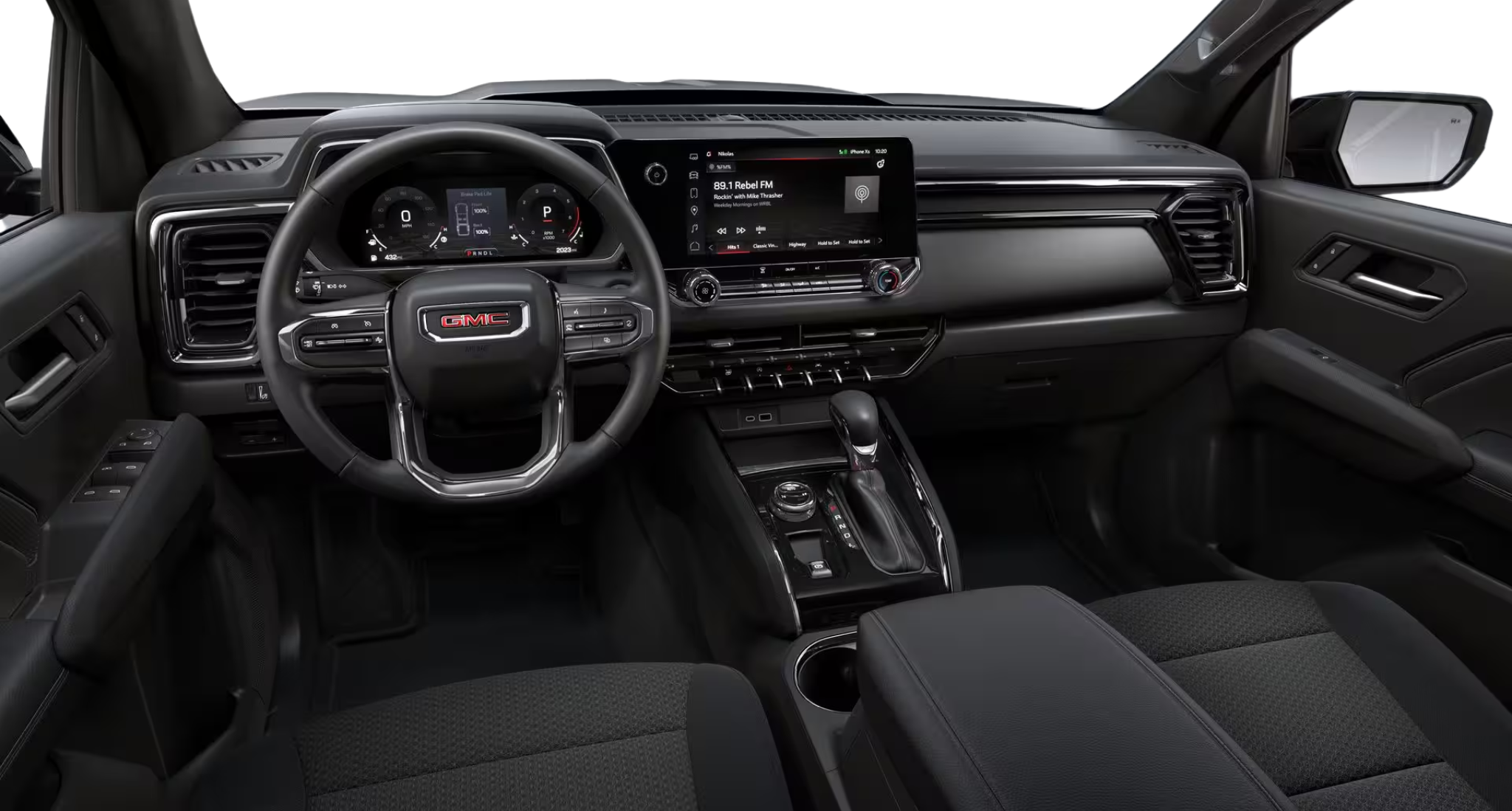 2025 GMC Canyon Elevation 4X4 driver’s cockpit with digital gauge cluster, infotainment screen, and premium steering wheel.