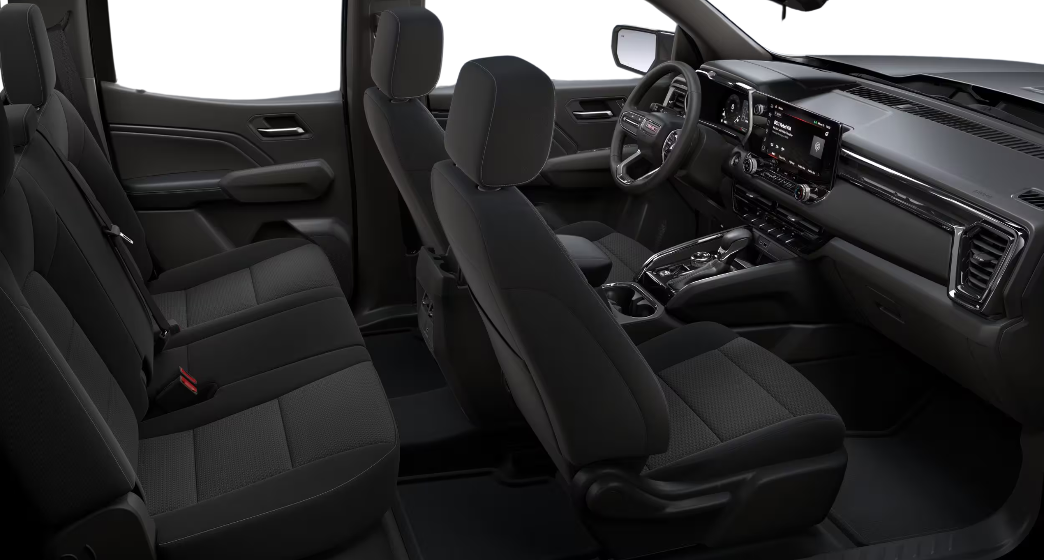 Spacious interior of the 2025 GMC Canyon Elevation 4X4 showcasing premium black cloth seats and rear passenger legroom.