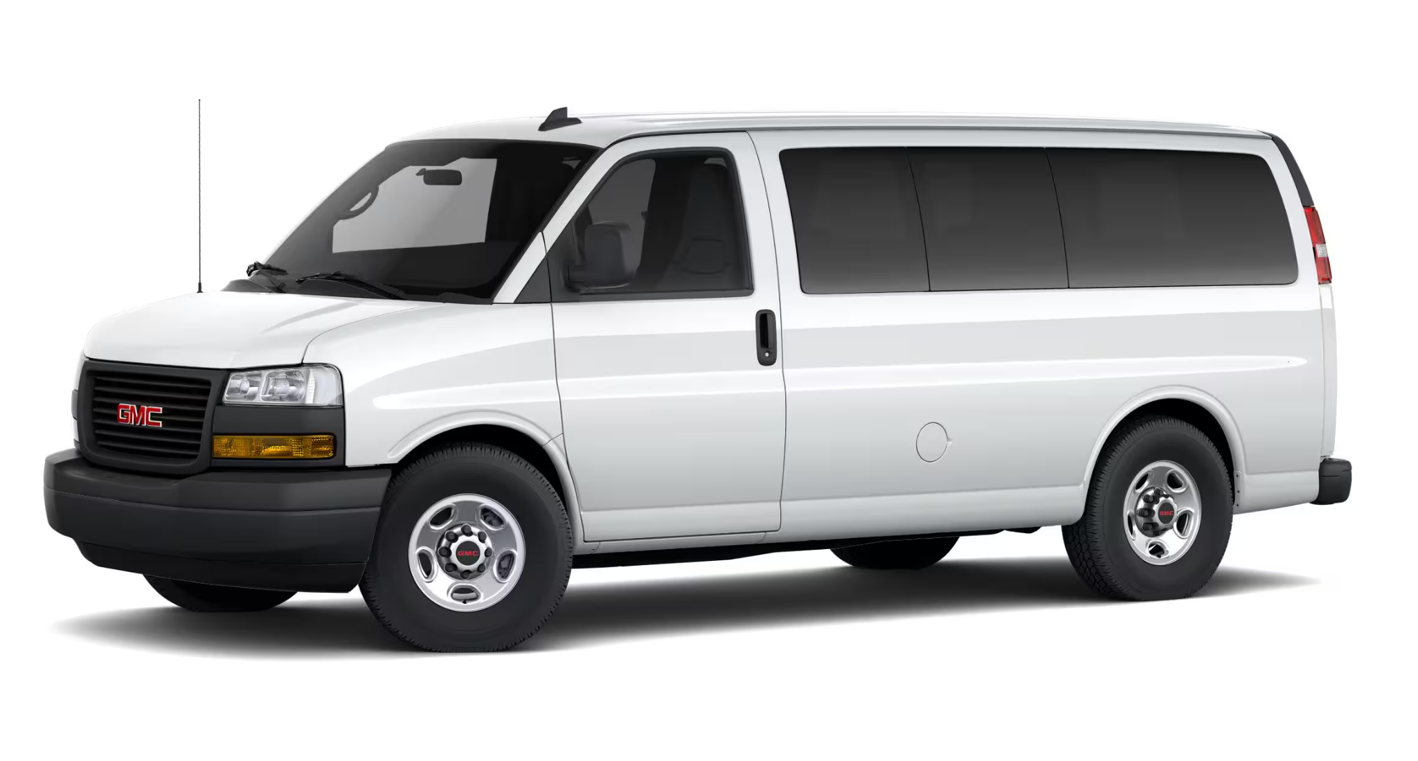2025 GMC Savanna Passenger LS RWD side profile highlighting sleek white body, deep-tinted glass, and 16-inch steel wheels with all-season tires.