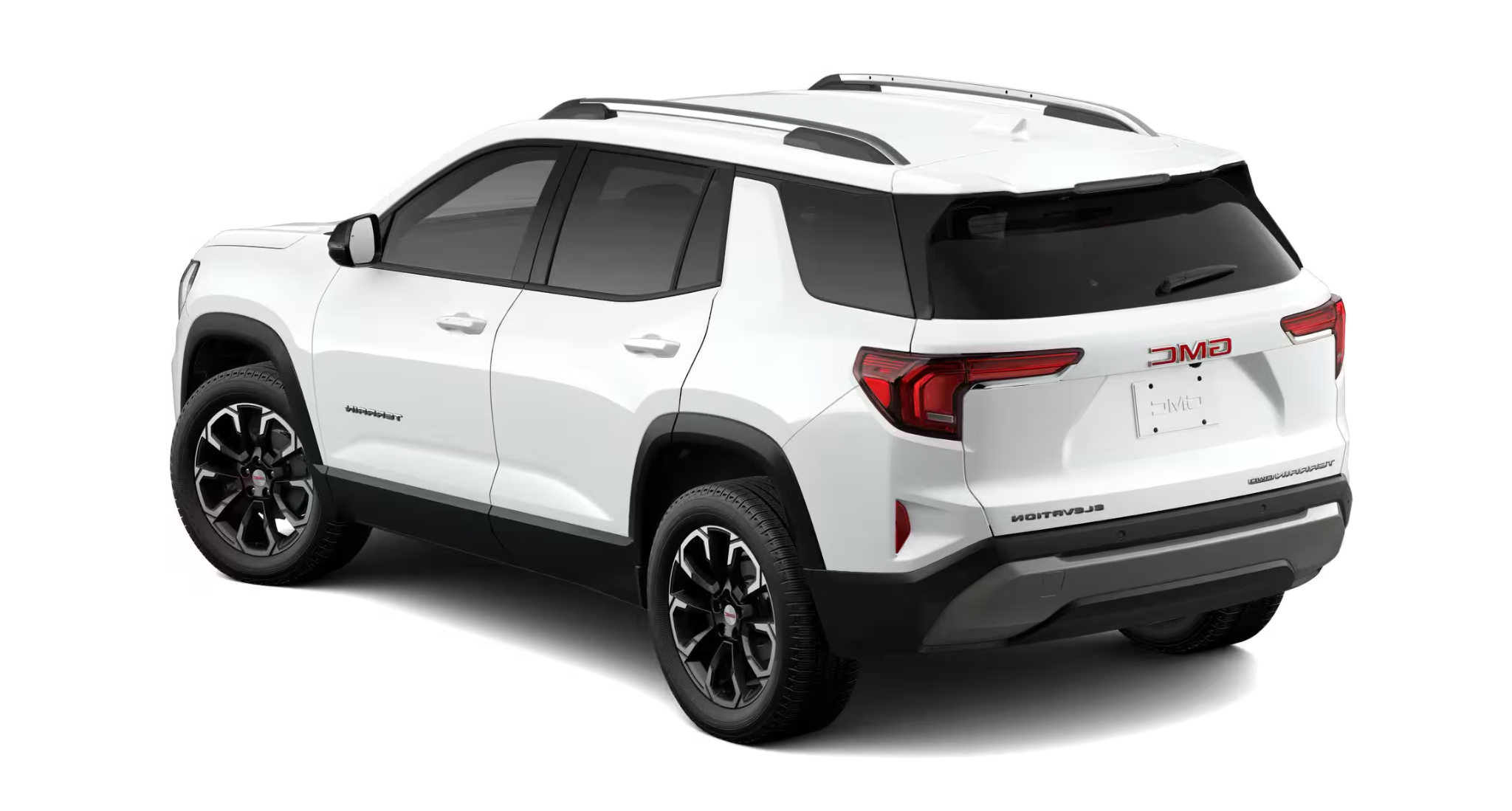 Rear view of the 2025 GMC Terrain Elevation AWD in white, showcasing the black trim, LED taillights, and Elevation badge.