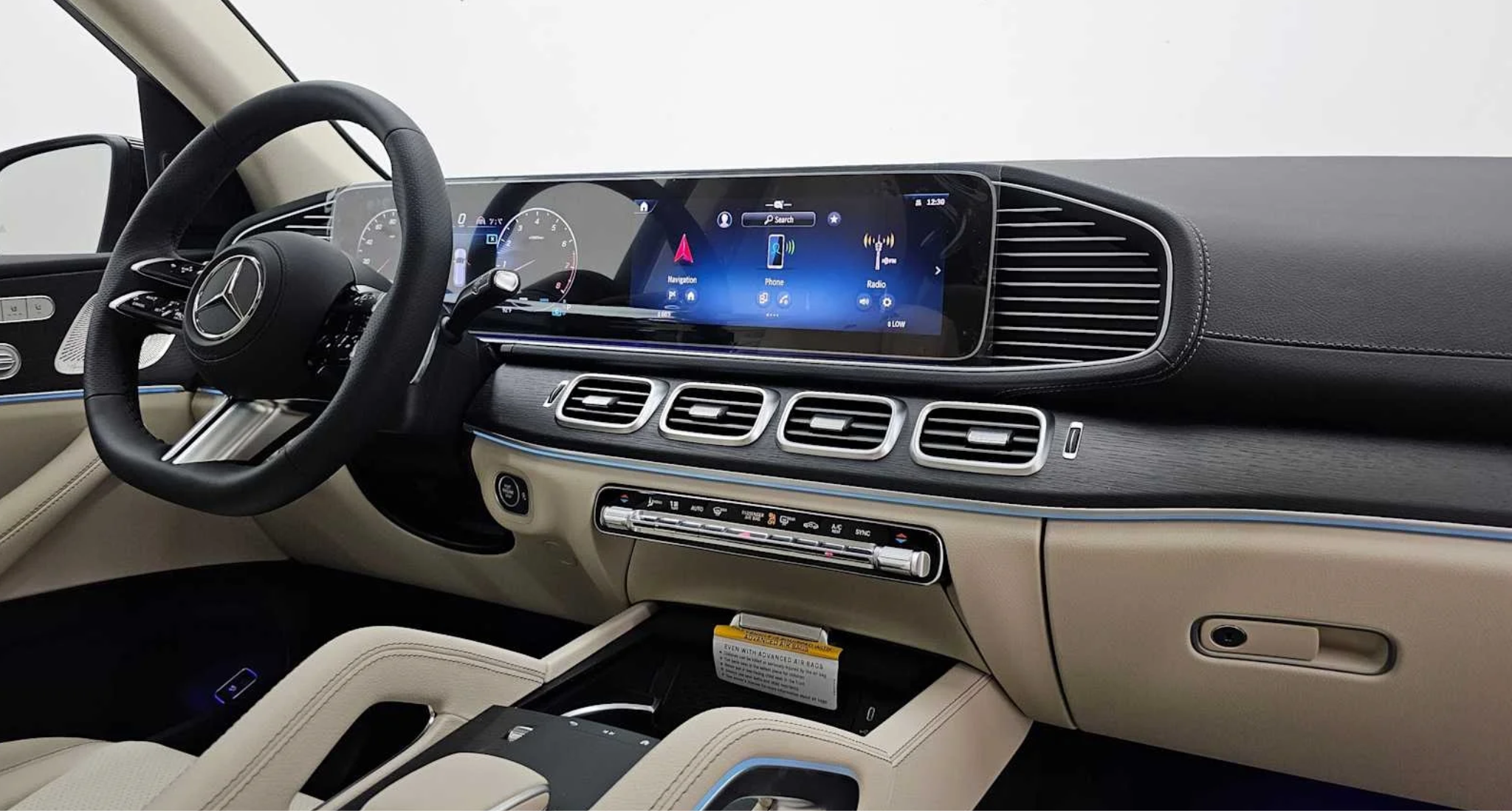 2025 Mercedes-Benz GLS 450 4MATIC SUV interior dashboard with digital MBUX display, leather steering wheel, and brushed aluminum accents