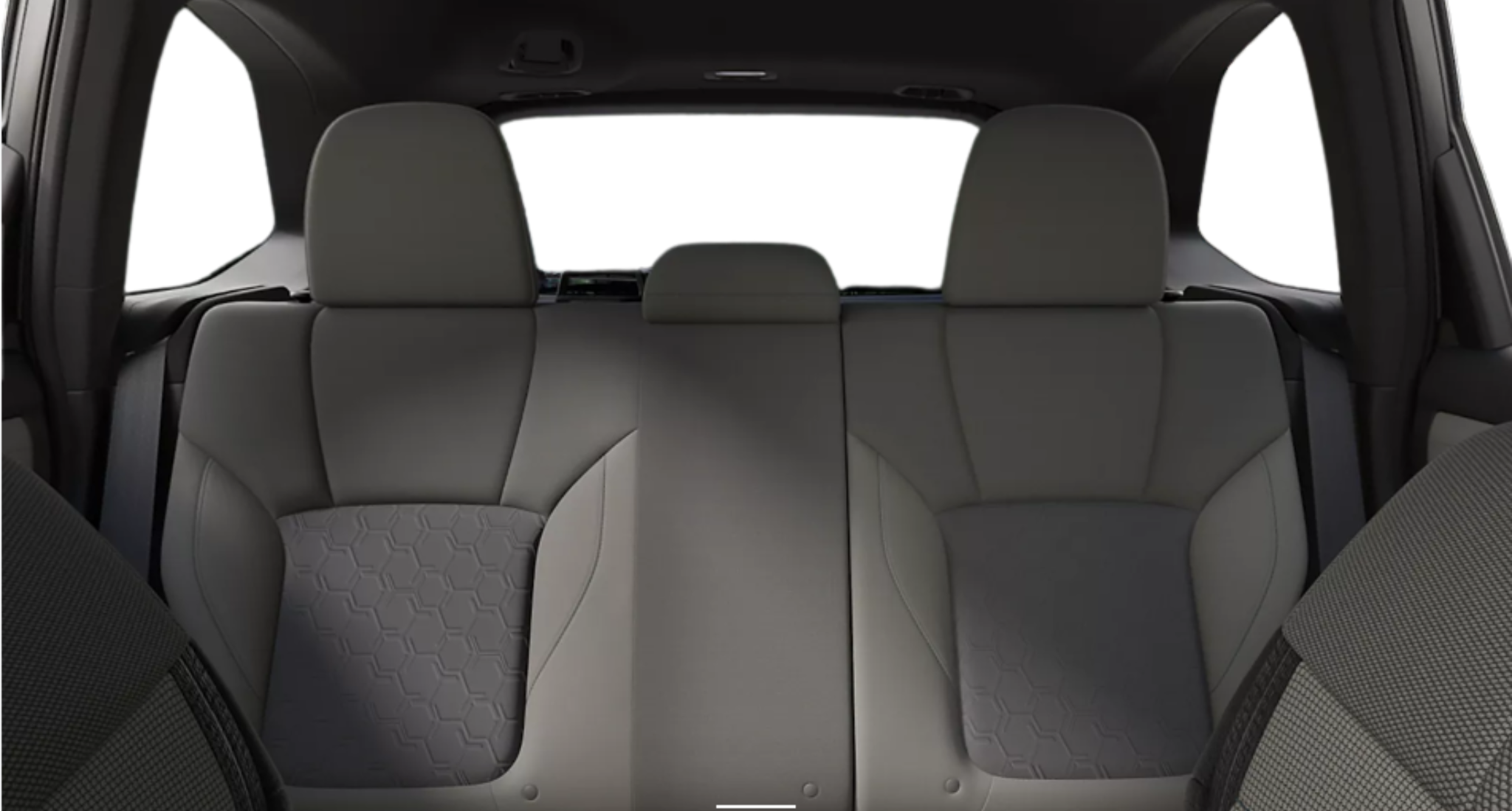 Spacious rear seats of the 2025 Subaru Forester Base AWD with two-tone upholstery, center headrest, and 60/40 split-folding capability.