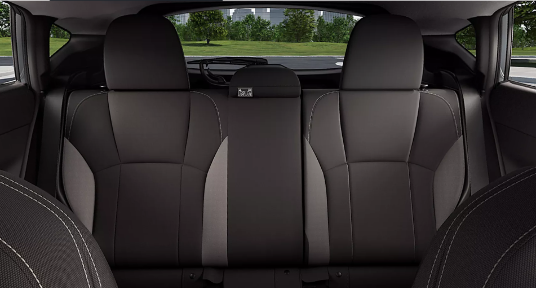 Rear seats of the 2025 Subaru Impreza Base AWD with two-tone cloth upholstery and 60/40 split-folding design