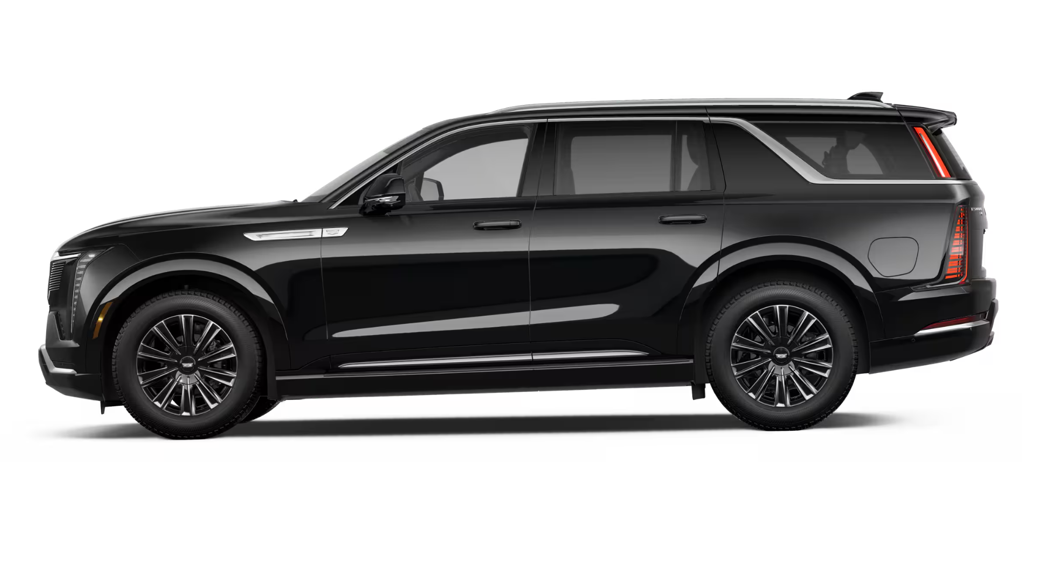 Side profile of the 2025 Cadillac Escalade IQL Luxury AWD, displaying sleek lines, large alloy wheels, and full-length SUV body design in gloss black.