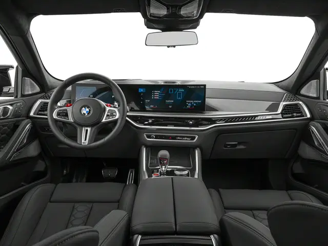 Interior dash view of the 2025 BMW X6M, featuring luxury tech for BMW lease specials in NYC.