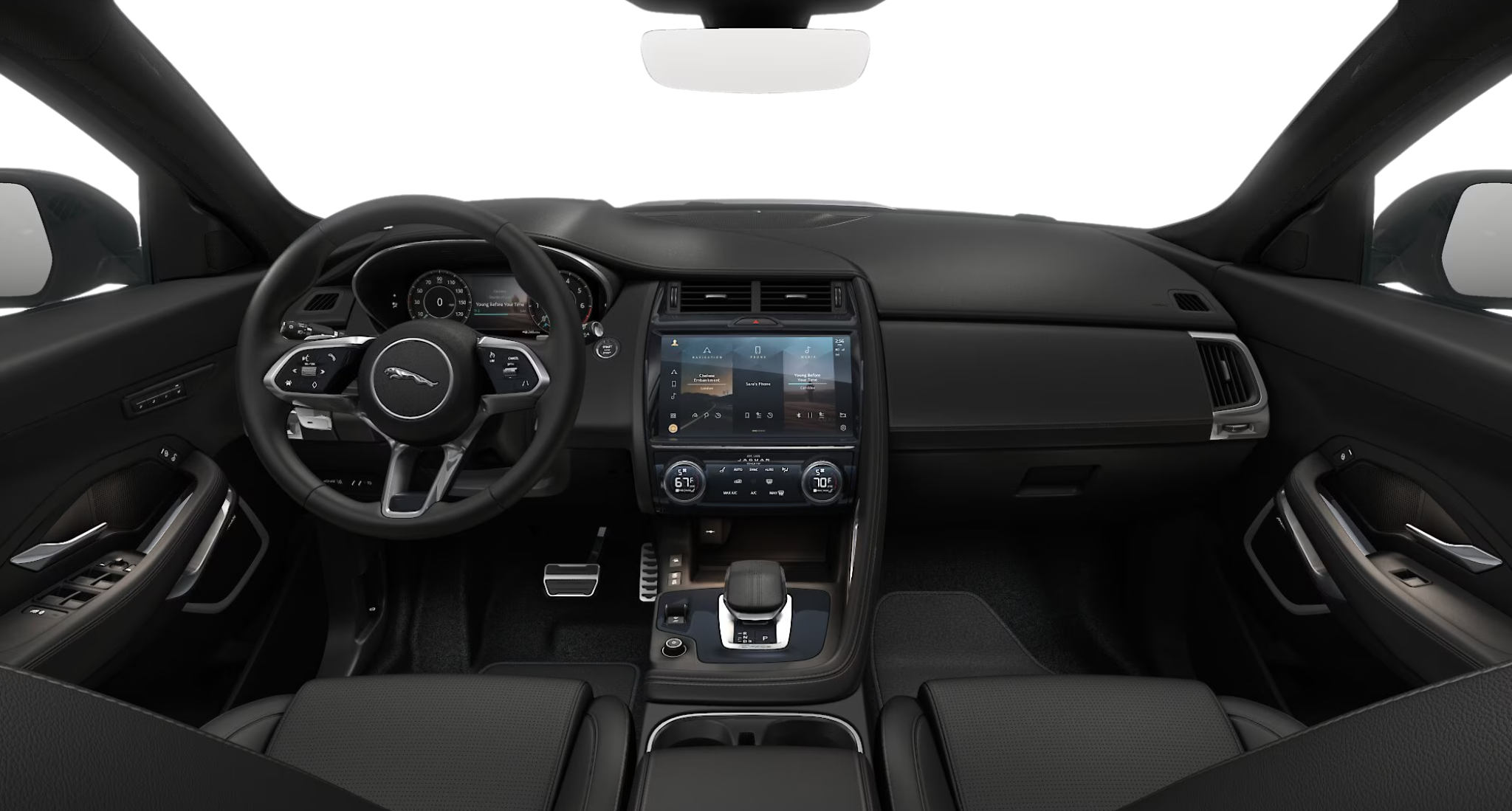 Driver cockpit of the 2024 Jaguar E-Pace R Dynamic SE AWD featuring Pivi Pro touchscreen, digital gauges, and heated leather steering wheel.