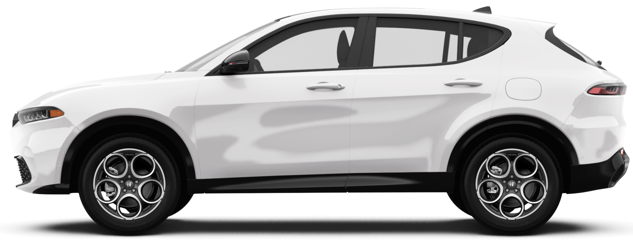 Side profile of the 2025 Alfa Romeo Tonale Hybrid in white, displaying aerodynamic body lines and 18-inch diamond-cut alloy wheels.