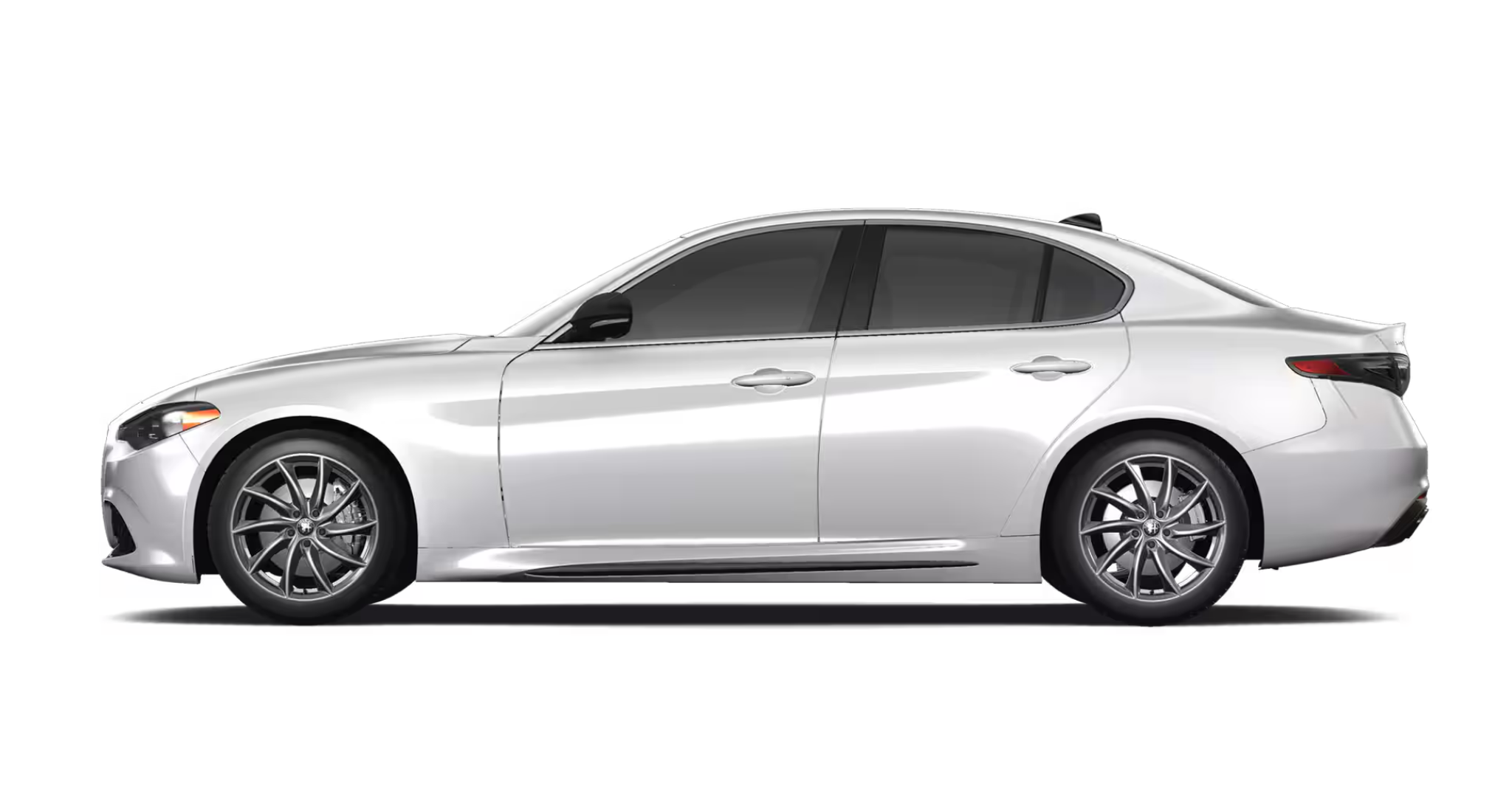 Side profile of the 2025 Alfa Romeo Giulia RWD showcasing its sleek Italian design, 18-inch wheels, and aerodynamic lines.