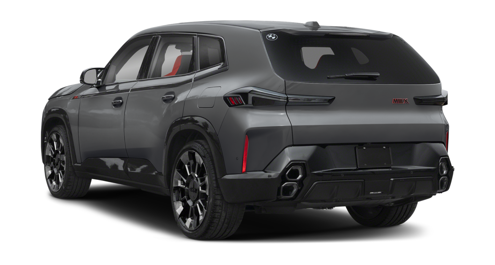 Rear profile of the 2025 BMW XM PHEV AWD showcasing quad exhaust, rear diffuser, and M badge under Shadowline trim.