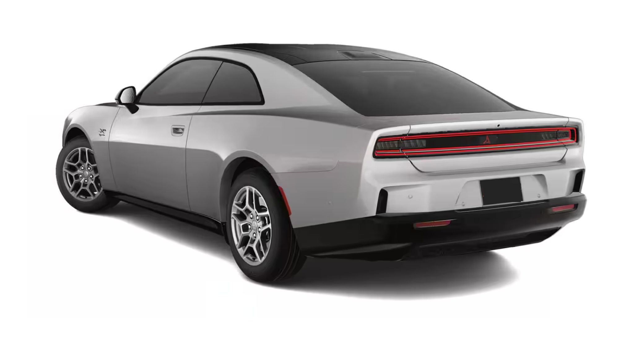 Rear angle of the 2025 Dodge Charger R/T AWD in White Knuckle paint, highlighting LED tail lamps and modern coupe silhouette.