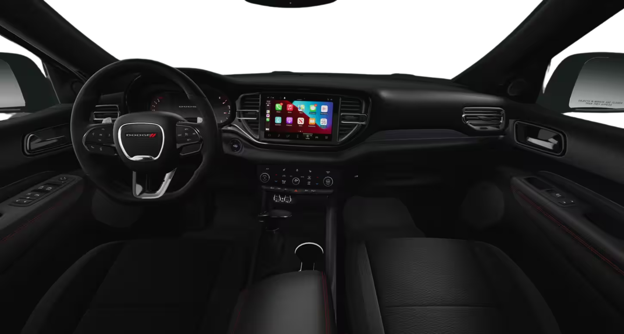 Interior view of the 2025 Dodge Durango GT AWD dashboard featuring a 10.1-inch touchscreen and heated leather steering wheel