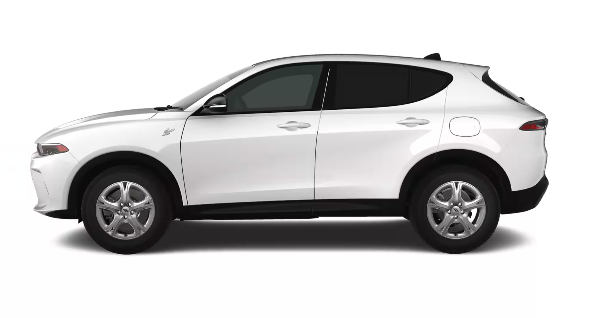 2025 Dodge Hornet GT AWD side profile in white featuring sleek body lines, 17-inch silver wheels, and compact SUV stance.