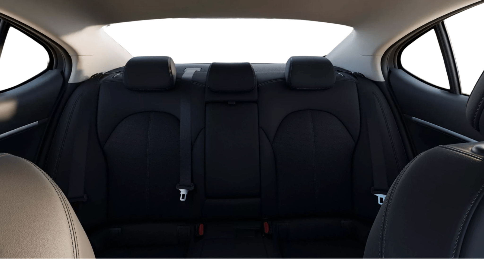Rear seat view of the 2025 Genesis G70 RWD featuring premium black leatherette upholstery and center armrest