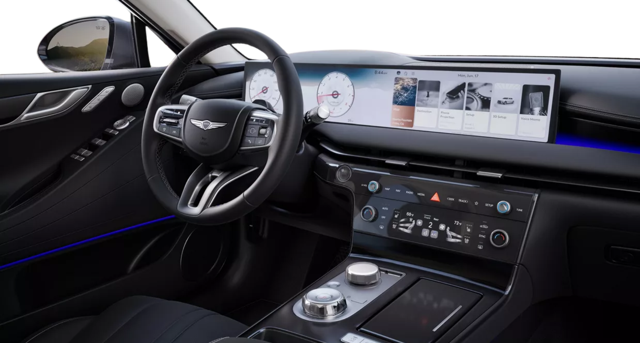High-tech driver cockpit of the 2025 Genesis G80 featuring a 27-inch OLED display, ambient lighting, and multifunction steering wheel.