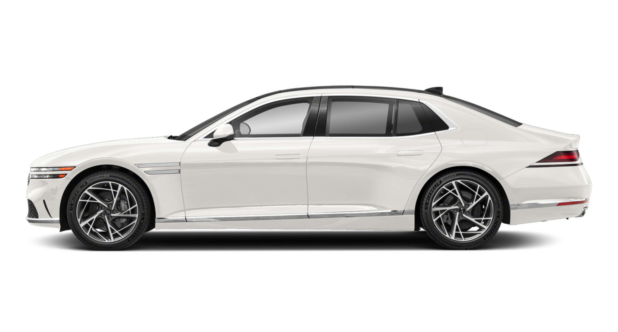 Sleek side profile of the 2025 Genesis G90 AWD in white, highlighting aerodynamic body lines and premium alloy wheels.