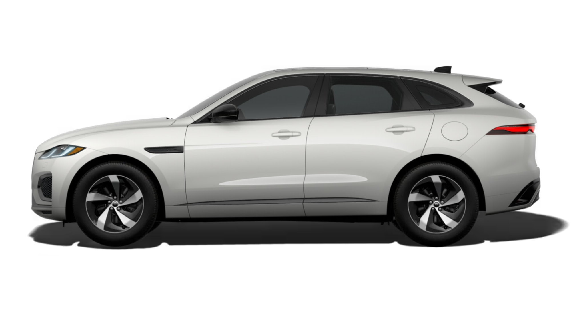 Elegant side profile of the 2025 Jaguar F-Pace R-Dynamic S AWD in white with gloss black wheels and sculpted panels.