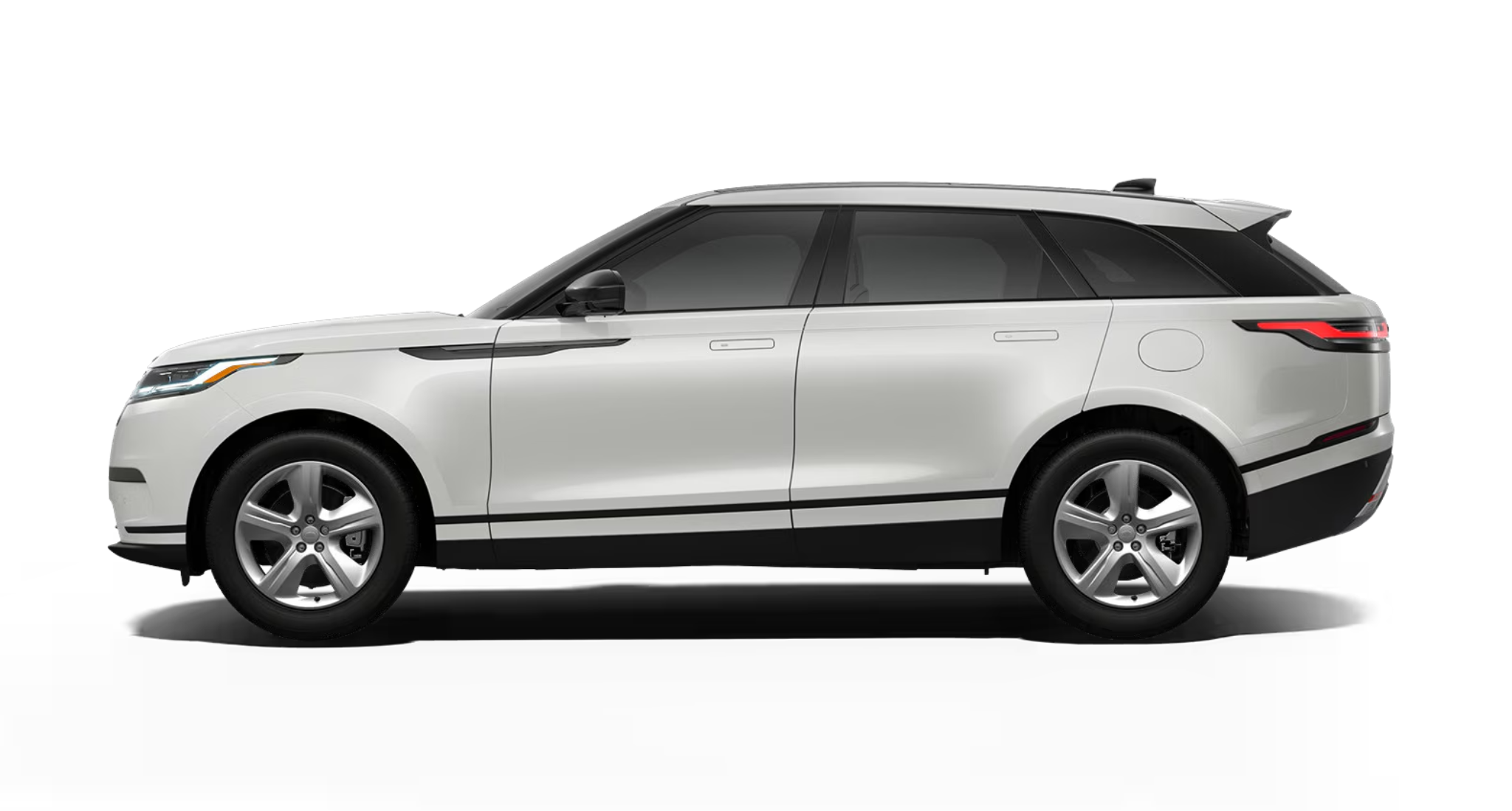 Side profile of the 2025 Range Rover Velar S AWD featuring flush door handles, alloy wheels, and floating roofline.