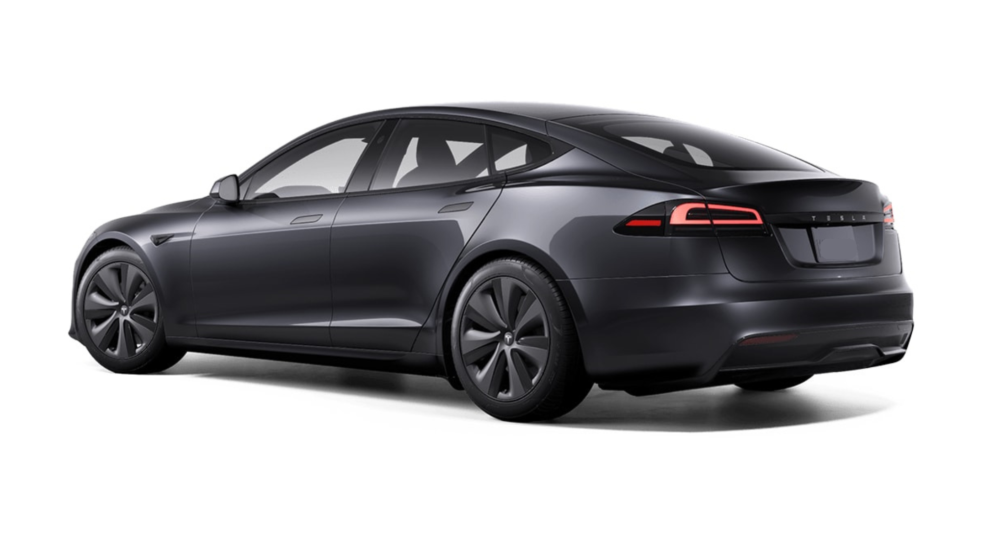 Rear angle of the 2025 Tesla Model S AWD in solid black with aerodynamic design and LED tail lights