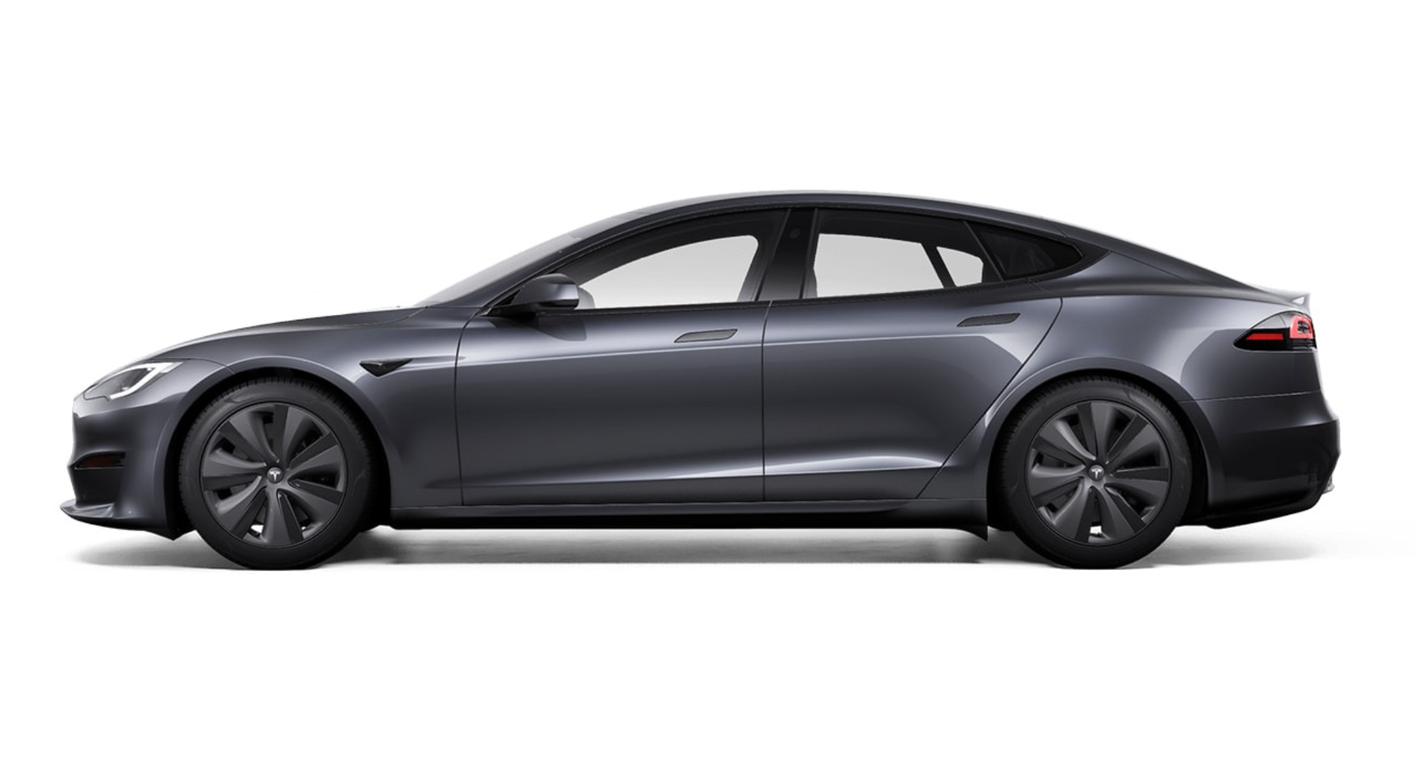 Side profile of the 2025 Tesla Model S AWD showcasing sleek body lines, flush door handles, and black turbine wheels