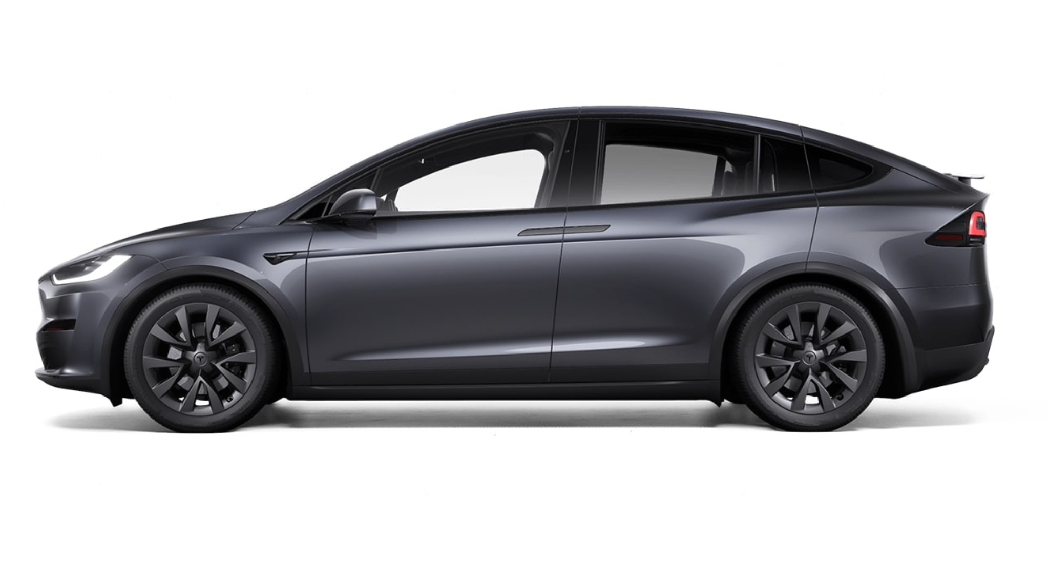 2025 Tesla Model X AWD side profile highlighting black alloy wheels, flush door handles, and sleek body lines