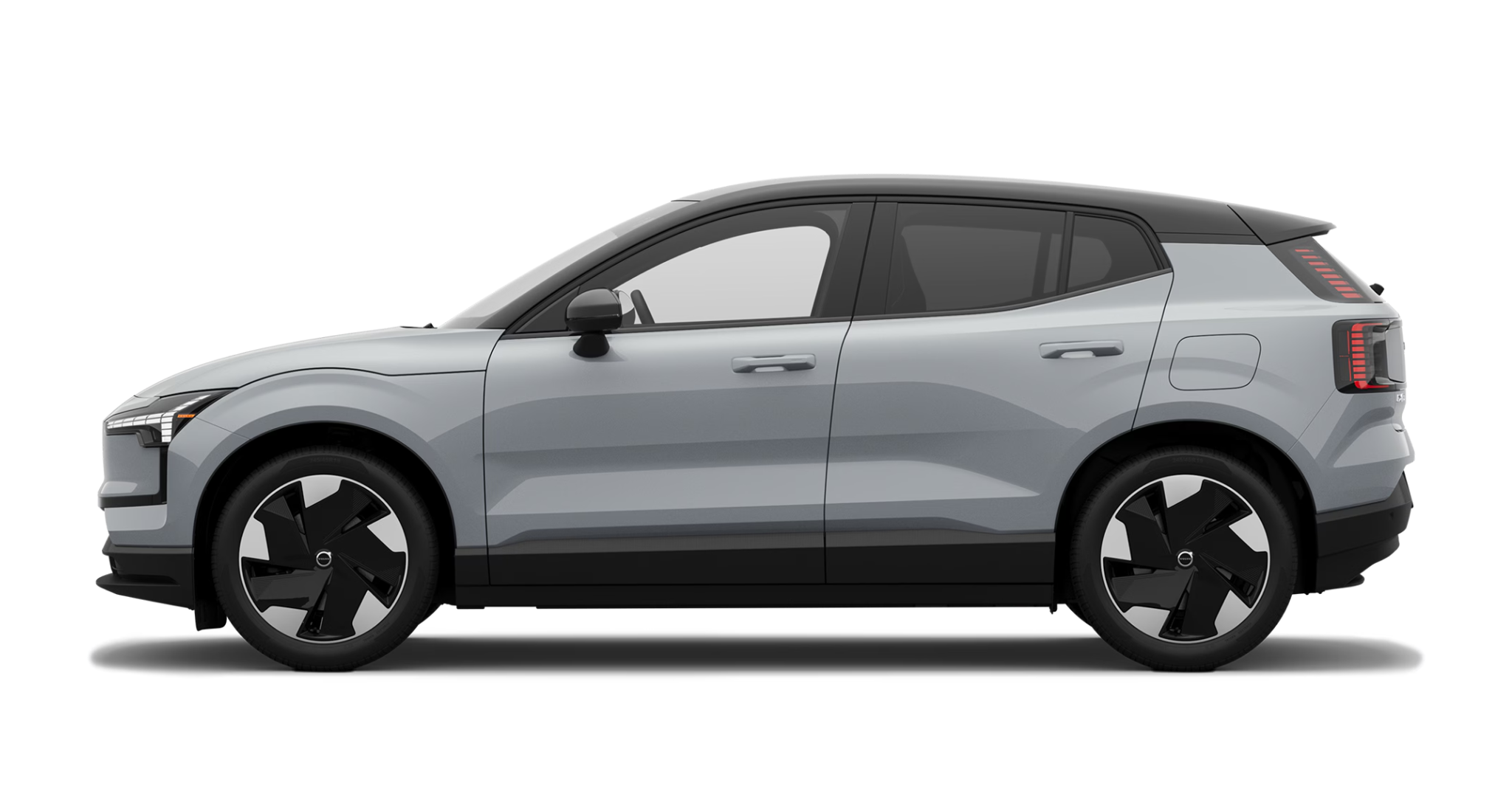 Side profile of the 2025 Volvo EX30 AWD Plus in Cloud Blue with black roof and aerodynamic 19-inch alloy wheels