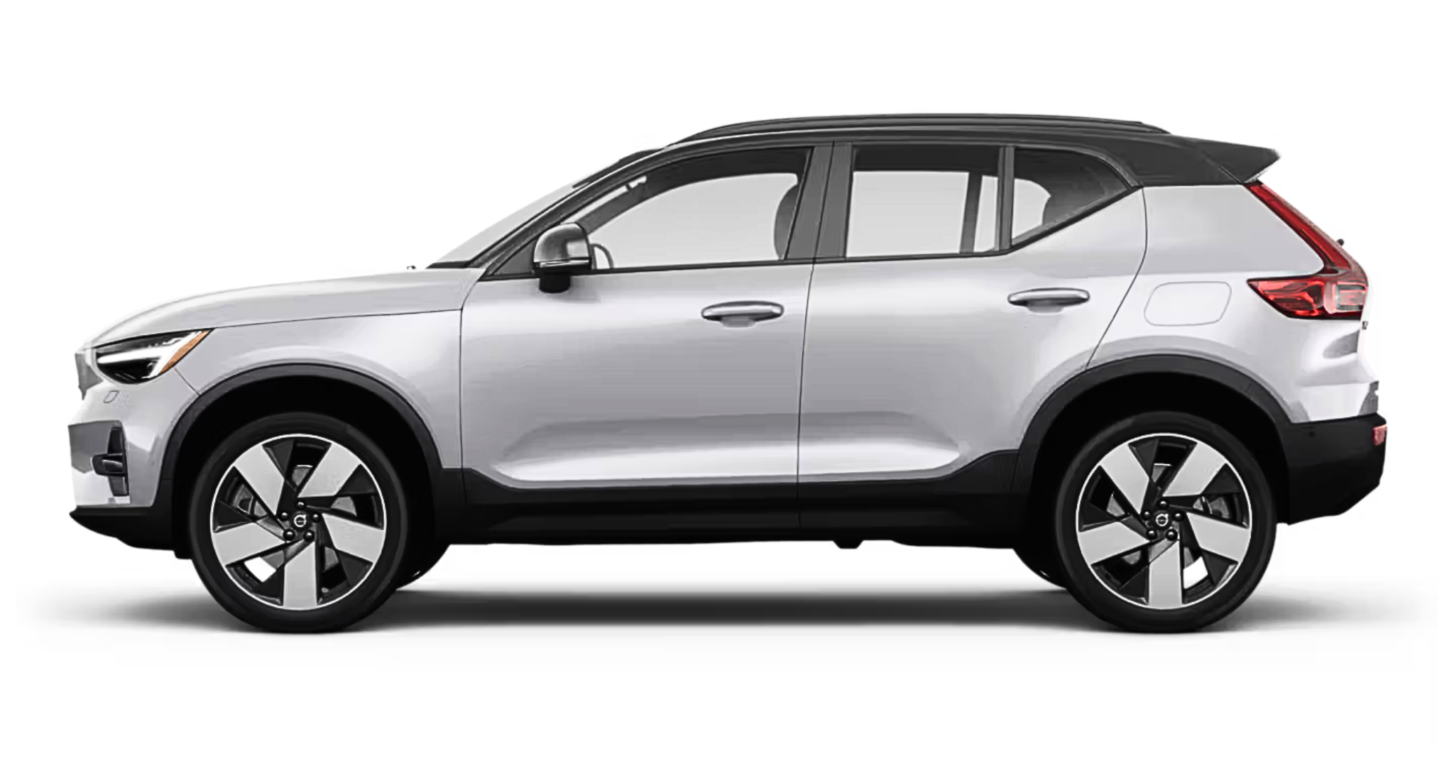 Side profile of the 2025 Volvo EX40 AWD Core highlighting the minimalist body lines, black roof contrast, and alloy wheels.