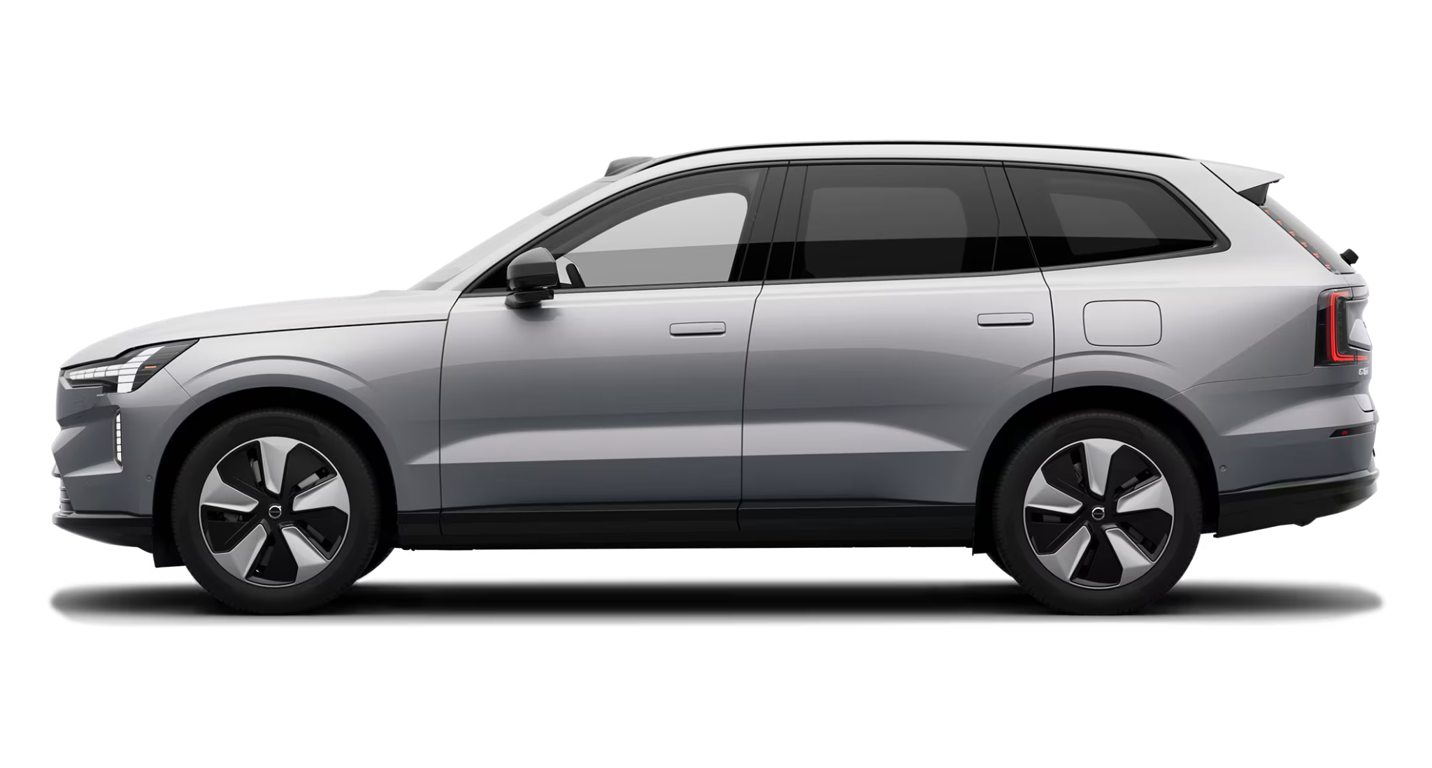 Side view of 2025 Volvo EX90 Plus AWD electric SUV in silver with 20-inch Aero wheels and sleek Scandinavian styling
