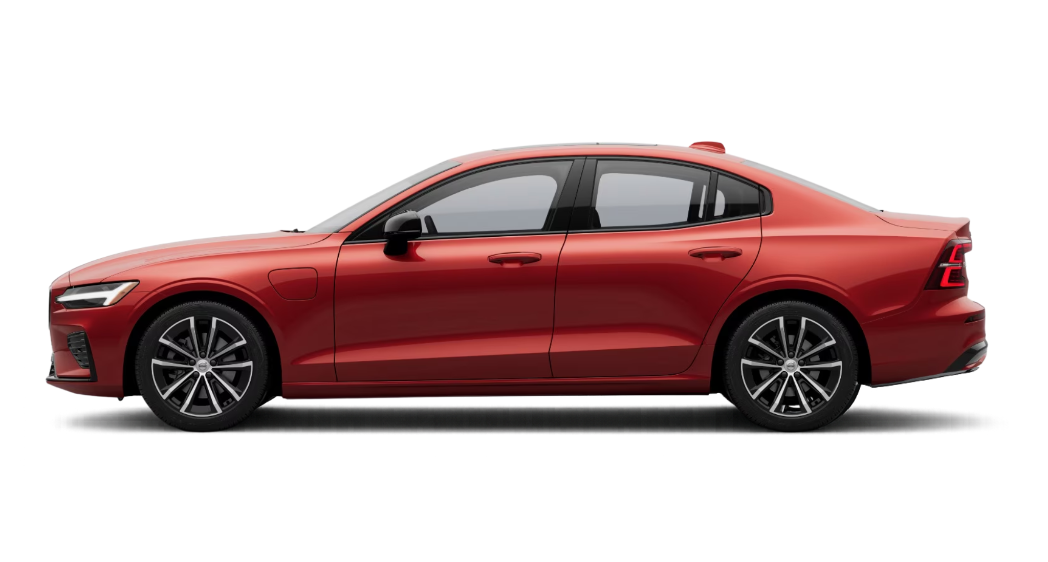 Side view of the 2025 Volvo S60 PHEV AWD sedan with sleek red body, black trim, and aerodynamic lines