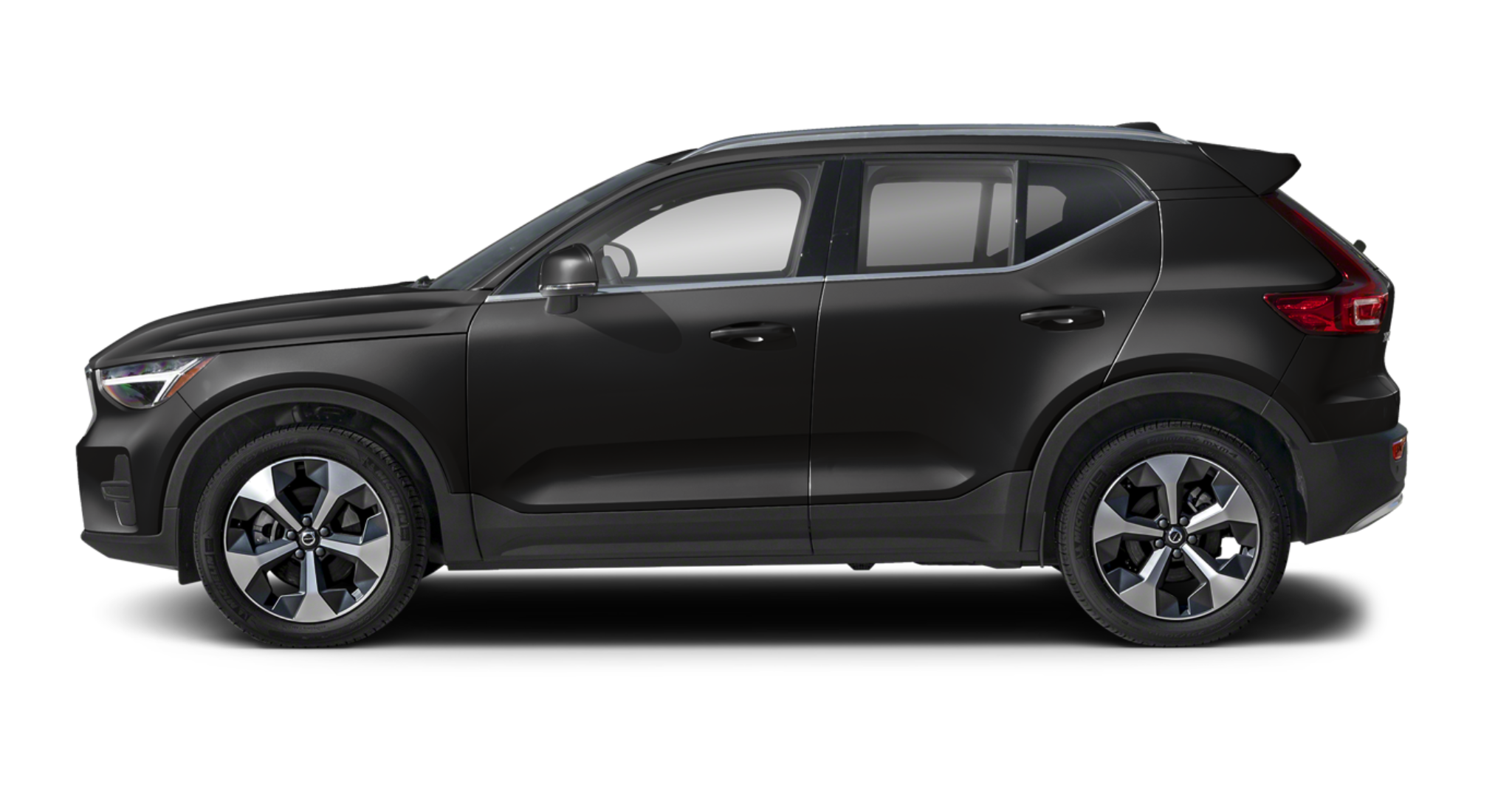 2025 Volvo XC40 AWD Core side profile displaying sculpted body lines, black trim, and 18-inch alloy wheels for a refined urban SUV presence.