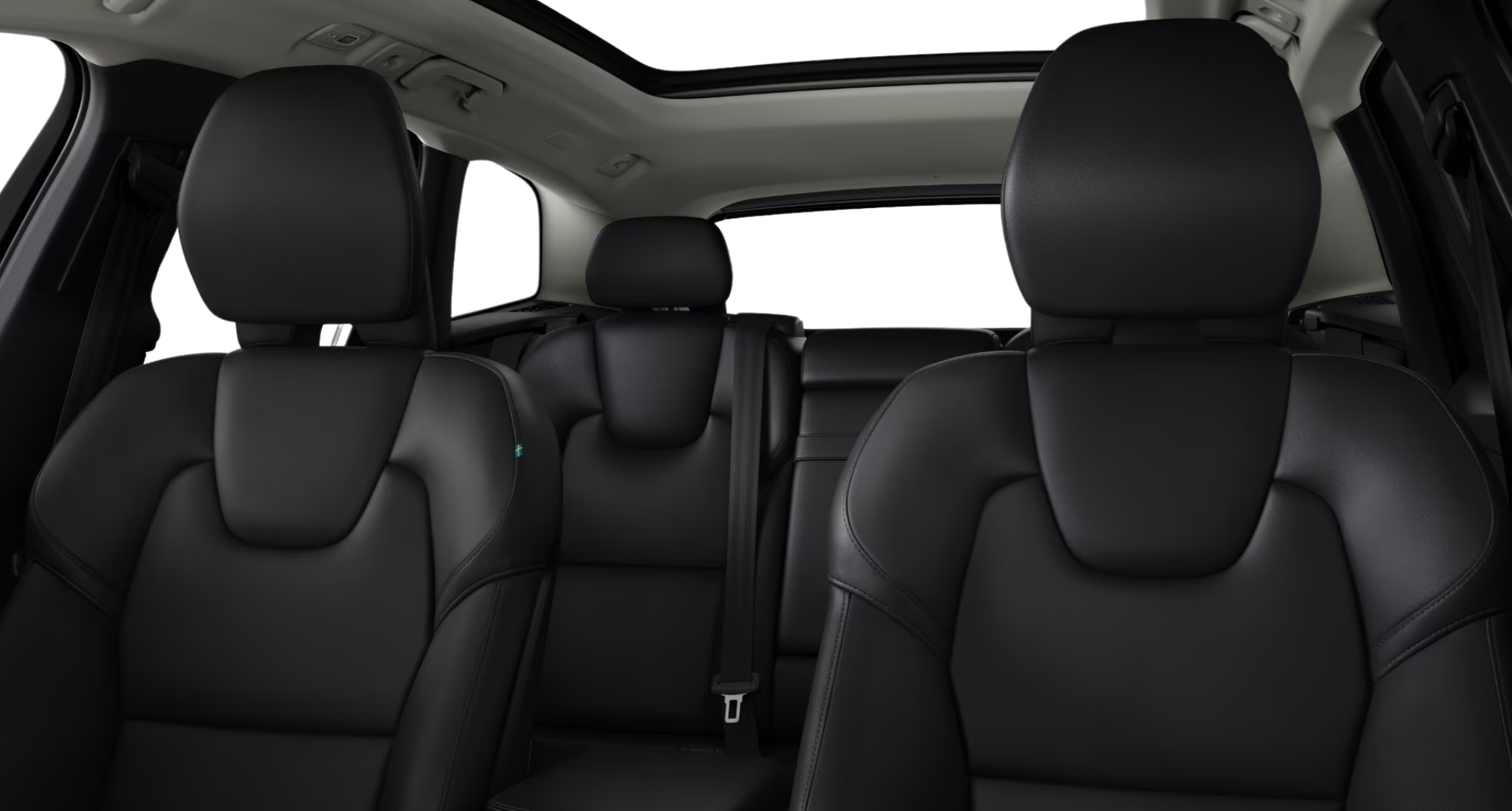Interior view of the 2025 Volvo XC60 AWD Core featuring premium black leatherette seats and a panoramic roof.