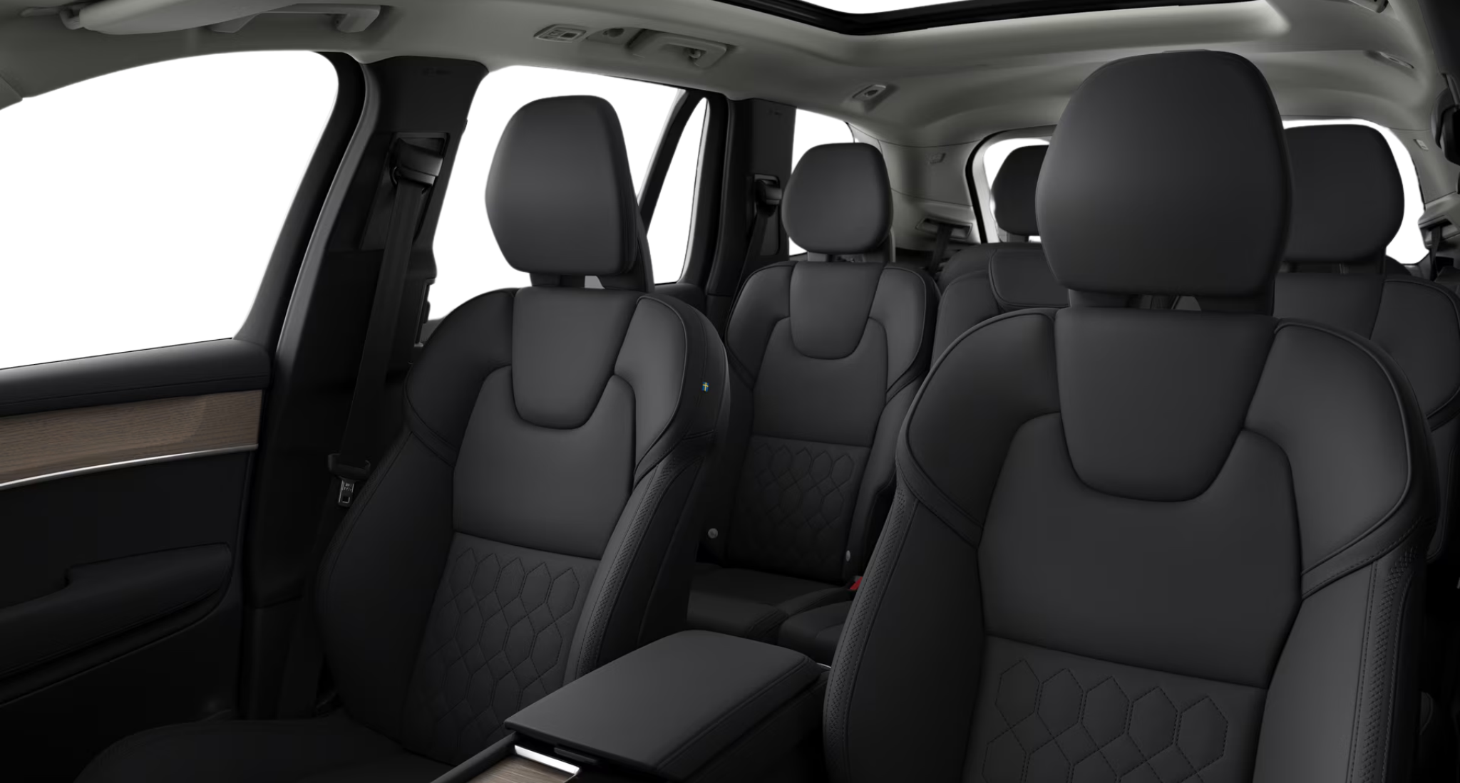 Luxurious black quilted seats inside the 2025 Volvo XC90 AWD Core with panoramic roof, Nordico upholstery, and spacious 3-row seating.