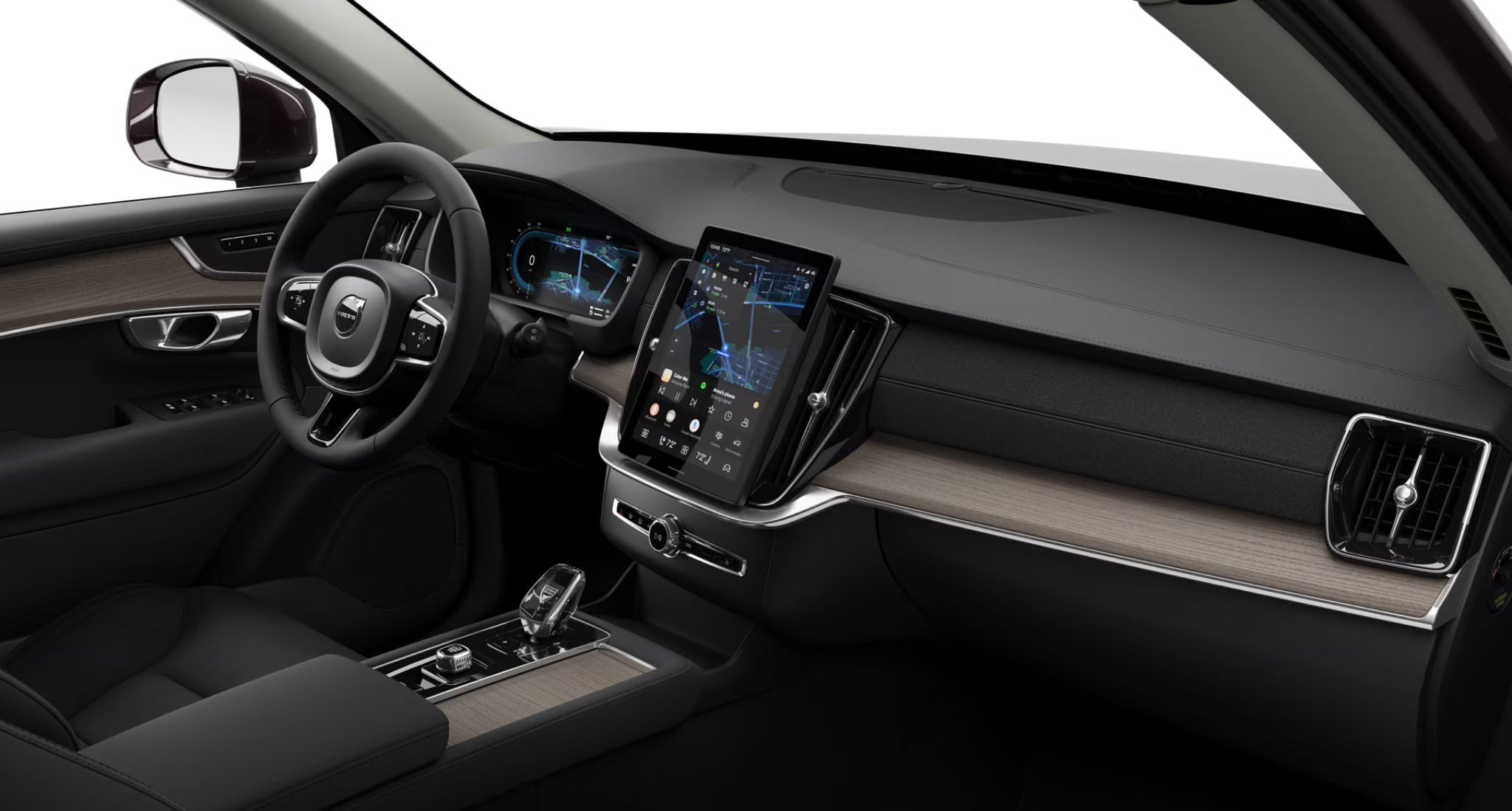 2025 Volvo XC90 PHEV dashboard with digital display, Google-powered touchscreen, and Orrefors crystal gear selector.
