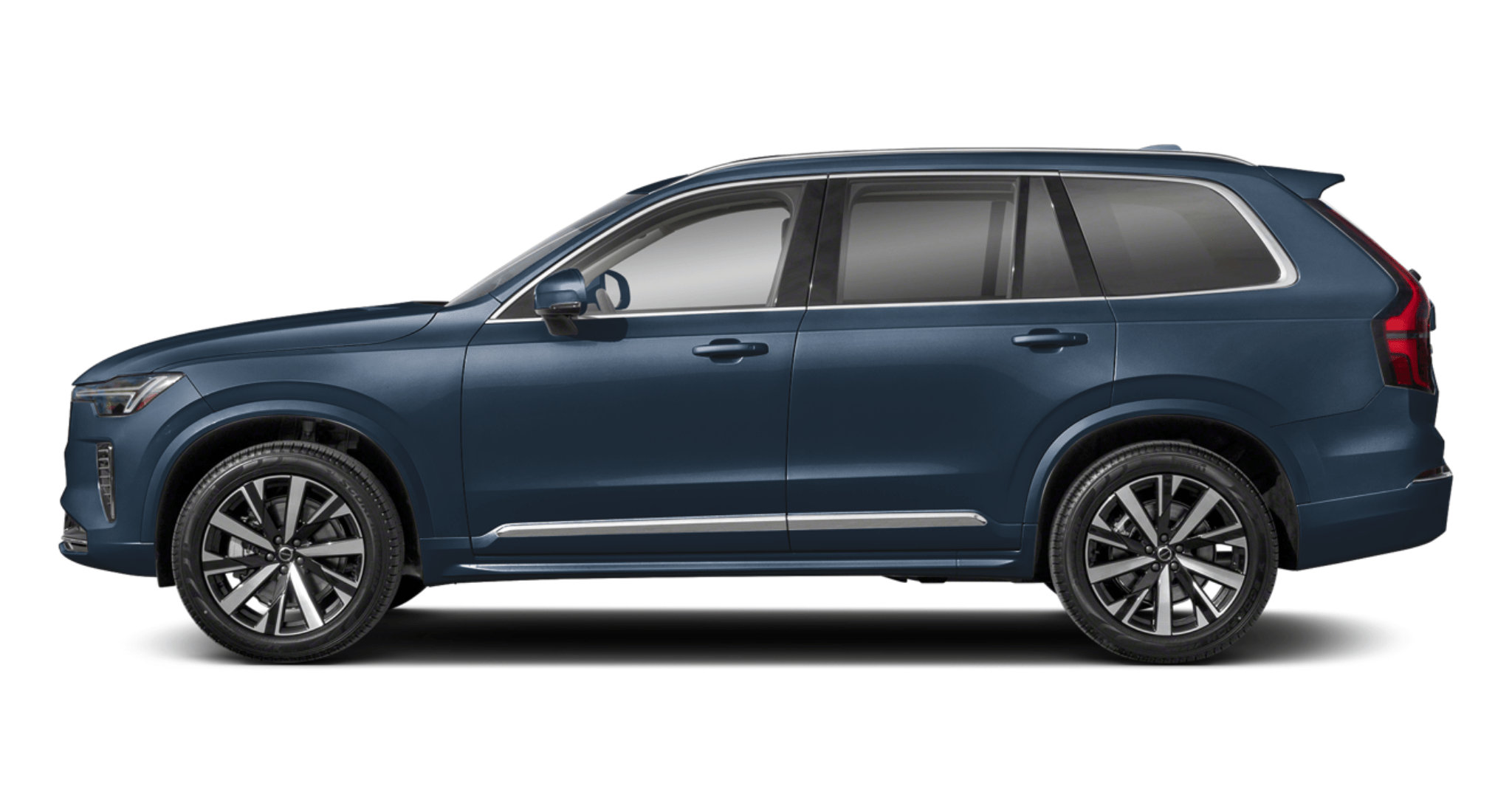 Side view of the 2025 Volvo XC90 AWD Core in Denim Blue, showcasing its elegant lines, large alloy wheels, and spacious 7-passenger SUV design.