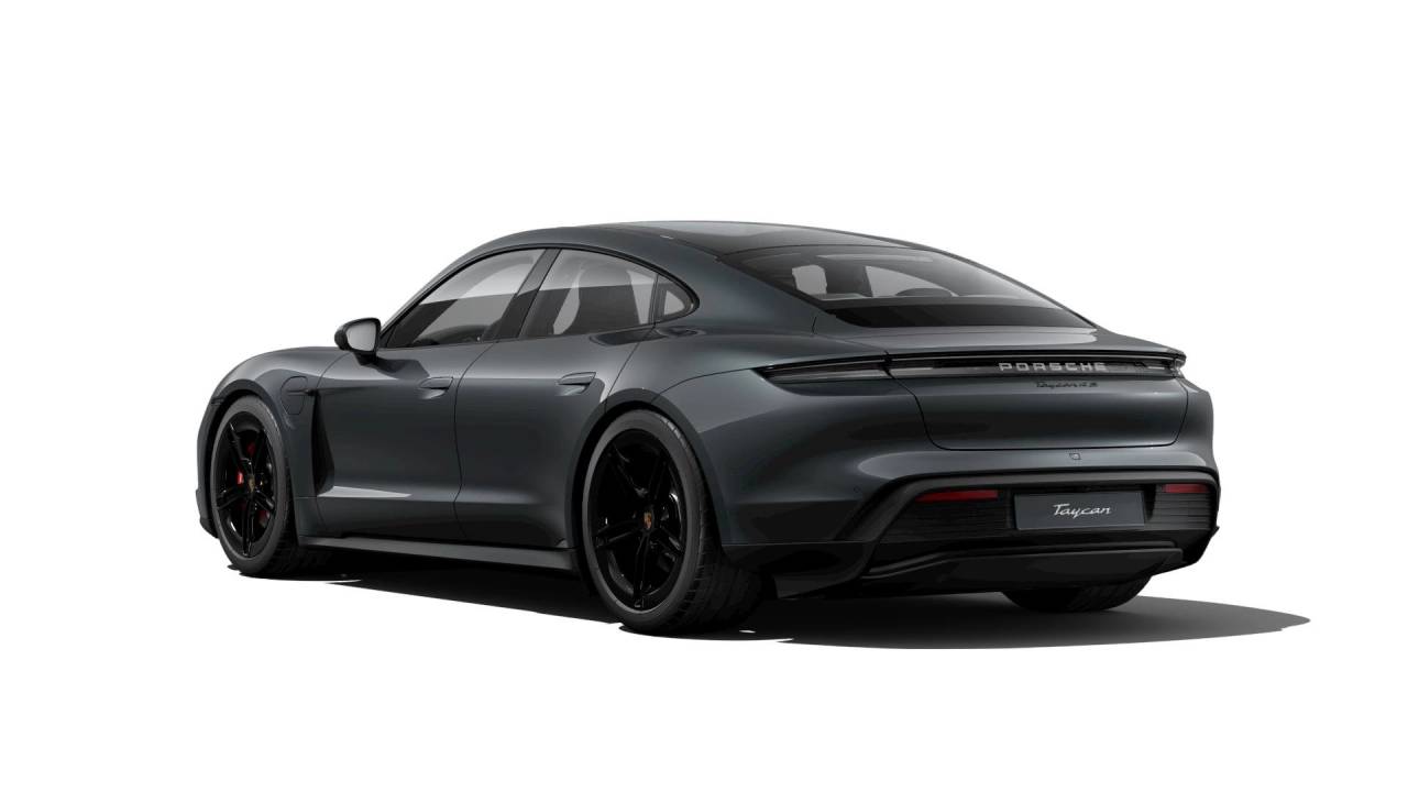 Rear view of the Porsche Taycan 2025 lease, highlighting the adaptive spoiler on this electric sedan.