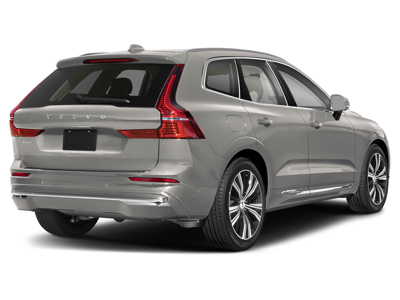 rear exterior of the 2025 Volvo XC60 PHEV AWD highlighting the bold grille, LED headlights, and plug-in hybrid charging port.