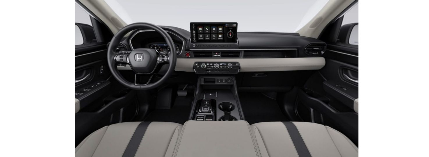Interior dashboard of 2026 Honda Passport RTL AWD with infotainment and climate control features