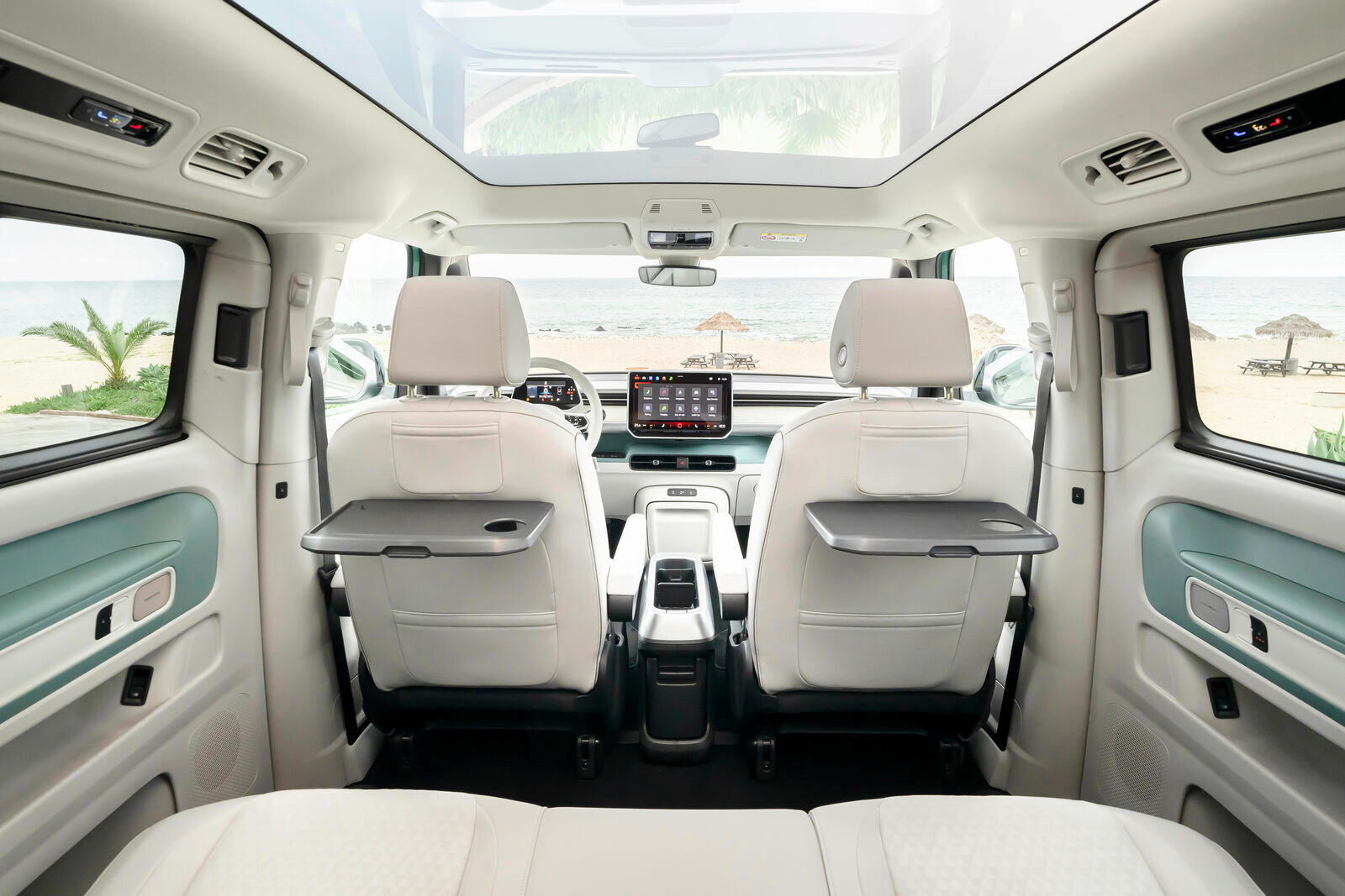 Cabin view of 2025 VOLKSWAGEN ID BUZZ LEASE with seating layout and ambient lighting