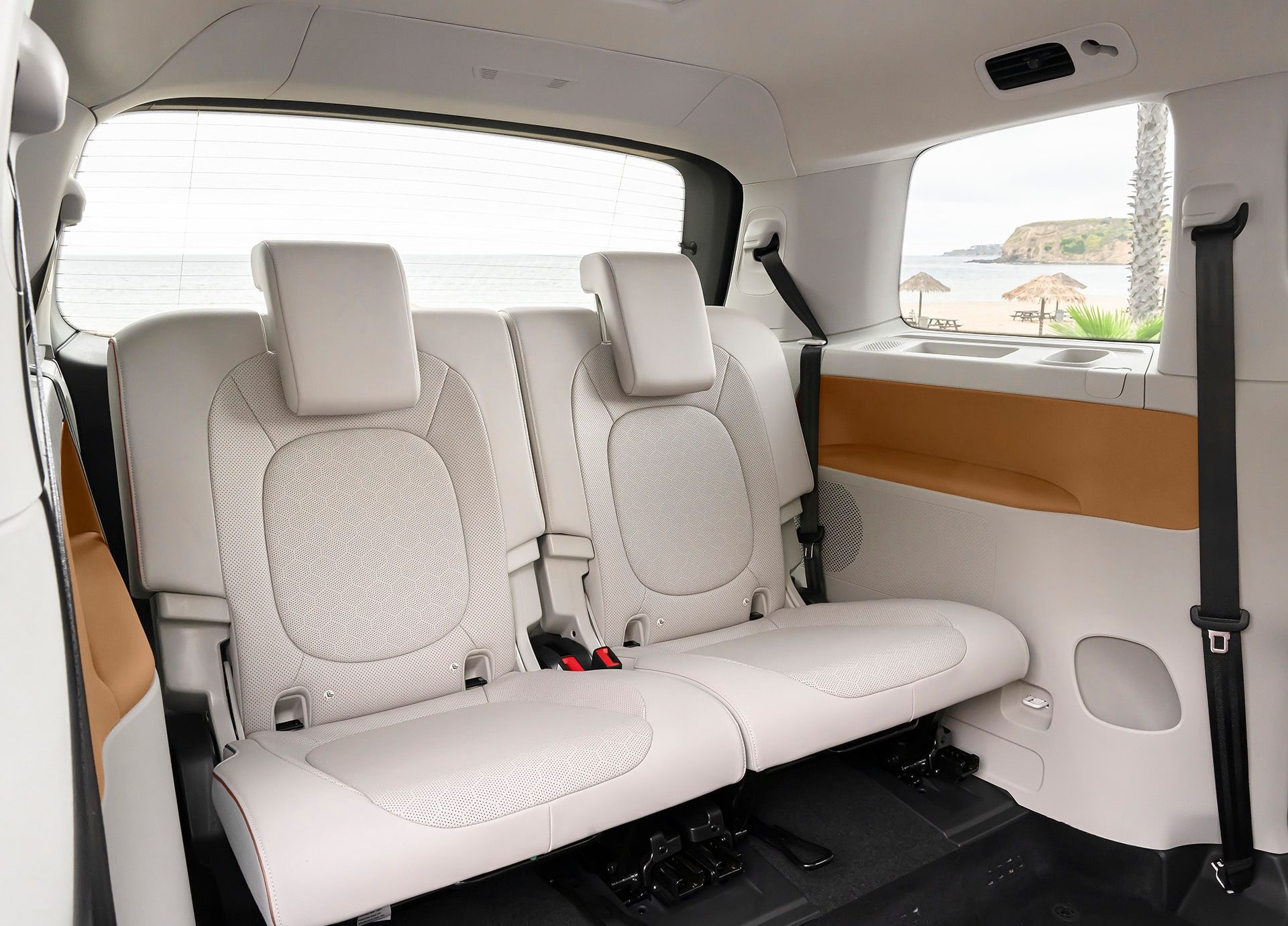 Cabin view of 2025 VOLKSWAGEN ID BUZZ LEASE with seating layout and ambient lighting
